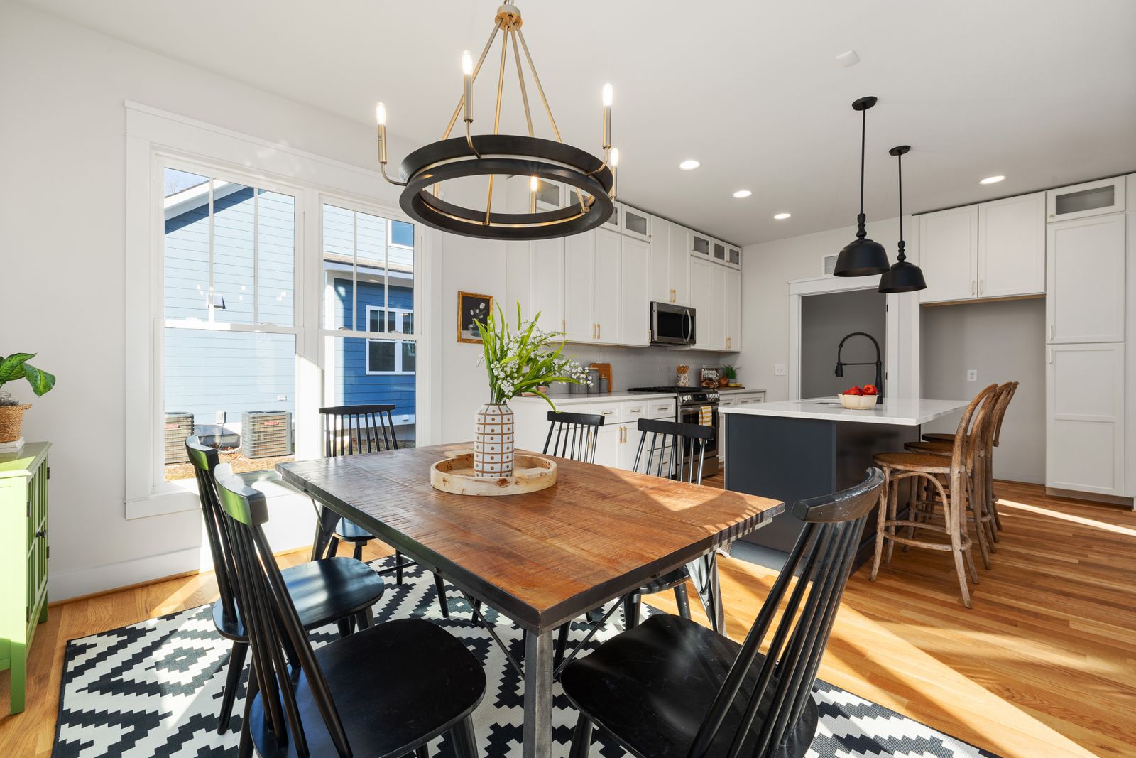 Modern kitchen and dining area in natural light